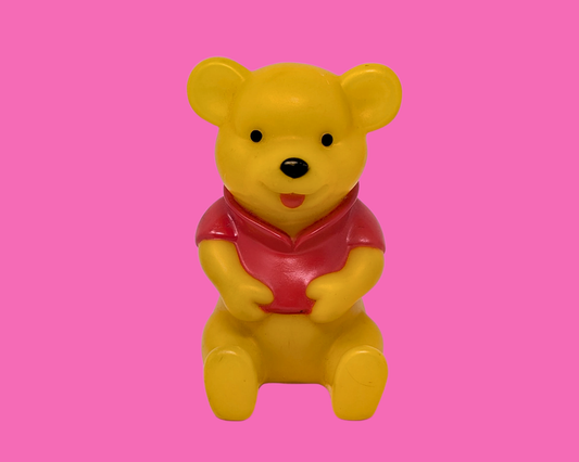 Petite tirelire en plastique Winnie l'ourson vintage des années 1980