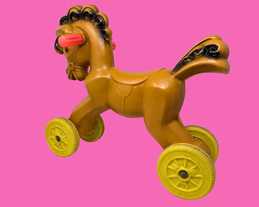 Cheval à roulettes en plastique vintage des années 1950 pour enfants