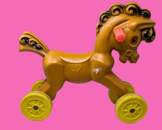 Cheval à roulettes en plastique vintage des années 1950 pour enfants
