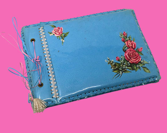 Album photo vintage en plastique bleu des années 1970