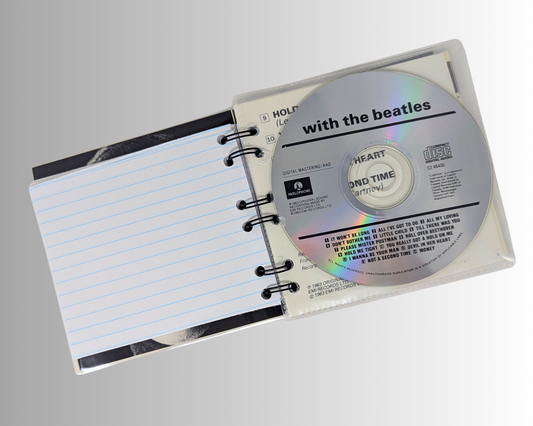 Les Beatles, avec le carnet CD des Beatles