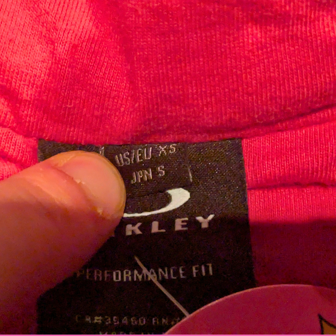 Black and Warm Pink Coloured Fleece by Oakley Size XS