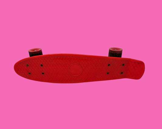 Mini skateboard rouge vintage des années 1990
