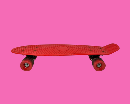 Mini skateboard rouge vintage des années 1990