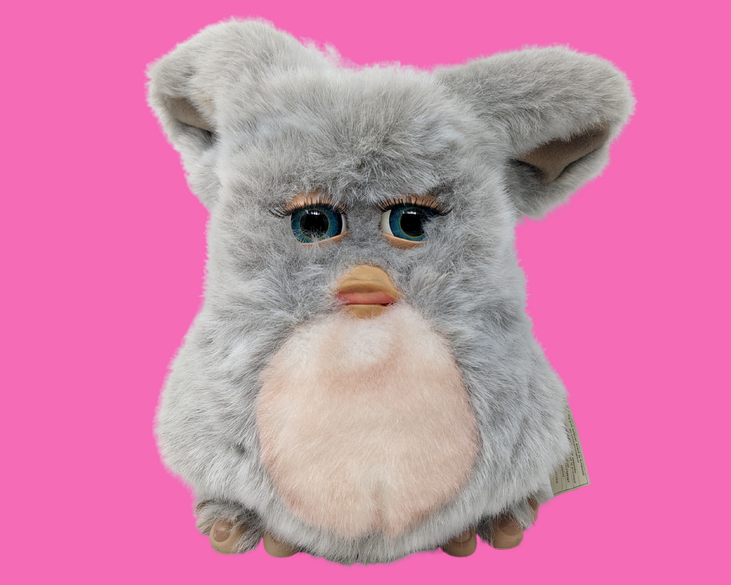 Jouet Furby pelucheux gris rétro