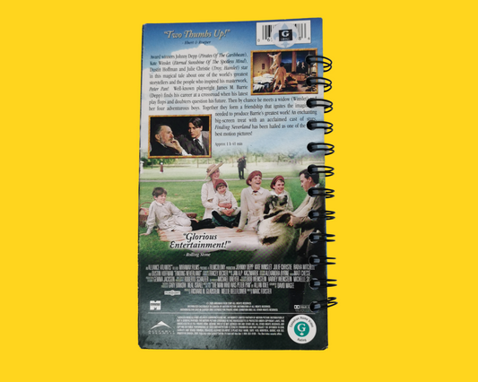 Cahier de film VHS recyclé à la recherche de Neverland